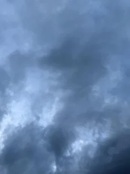Turbulent Dark Clouds in Dramatic Sky Stock Photos
