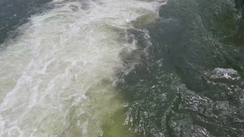 Turbulent flow foam bubble waterfall Stock Footage 205464200