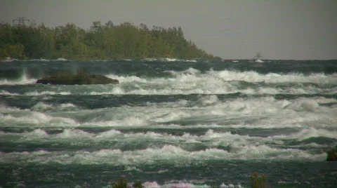 Turbulent river quickly flows in this water scenic (High Definition) Stock Footage 360275