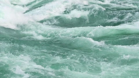 Turbulent river rapids dynamic powerful river rapids with swirling turquoise 動画素材 294297393