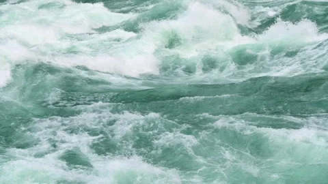 Turbulent river rapids dynamic vivid fast-moving emerald river rapids Stock Footage 294293012
