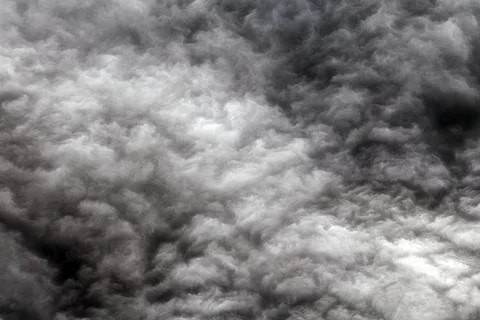 Turbulent stratocumulus storm clouds with dramatic layered atmospheric textur Stock Photos