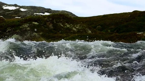 Turbulent stream flows over a rocky slope. Slow motion footage. Stock Footage 81727390
