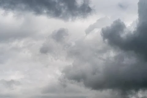 Turbulent thunderclouds with shadow pockets, dense vertical development and c Stock Photos