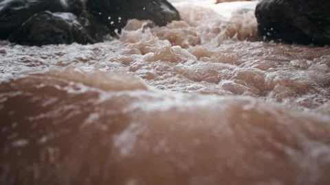 Turbulent water flow - close-up of the splash river Stock Footage 292592036