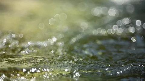 Turbulent water flow from a mountain stream in summer (slow motion) Video stock 262092260