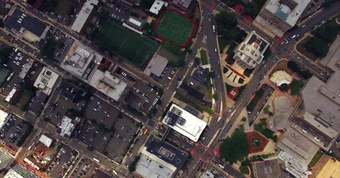 Turf soccer fields and a running track in a campus block 動画素材 63065019