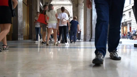 Turin: A ground level slow motion of people walking in via Roma Video stock 116056287