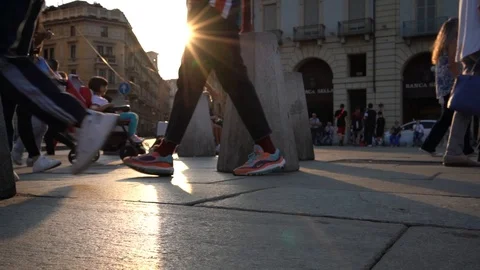 Turin: A ground level slow motion of people walking in Piazza Castello Video stock 116056299