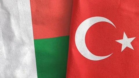 Turkey and Madagascar two flags textile cloth 3D rendering Stock Illustration