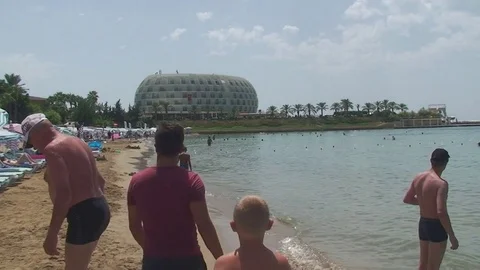 Turkey, Antalya, August 20, 2015 : people swim and sunbathe on the beach 库存影片 74074880