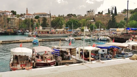 TURKEY, ANTALYA - August 20, 2017: Parking for tourist yachts in the sea harbor. Stock Footage 80211512