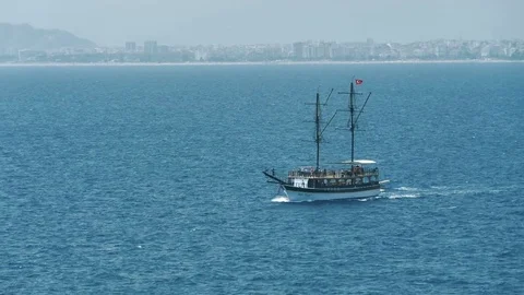 TURKEY, ANTALYA - August 20 , 2017 : Pirate yacht with tourists goes by the sea. Stock Footage 80395968