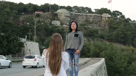Turkey, Antalya, March 2016 Two young beautiful women photographing themselves Stock Footage 62342536