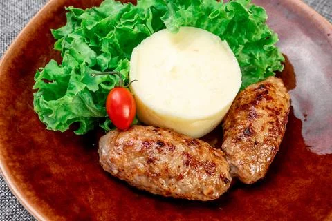 Turkey Cutlets with Mashed Potatoes and Fresh Salad. Close-up Stock Photos