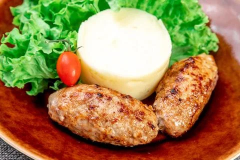 Turkey Cutlets with Mashed Potatoes and Fresh Salad. Close-up Stock Photos