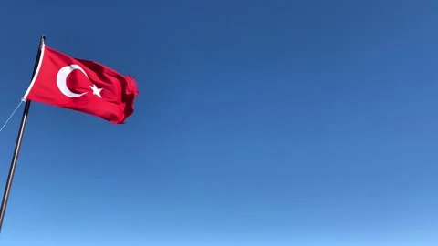 Turkey flag waving against deep blue sky 4K 60fps Stock Footage 147936839