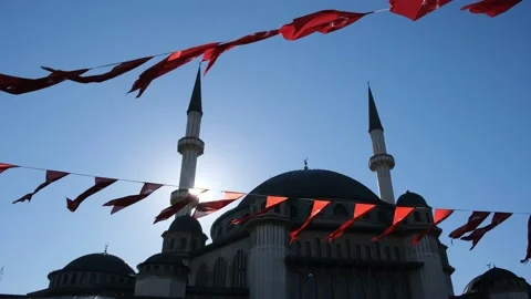 Turkey flags  against Taksim Square Mosque in Istanbul Stock Footage 194920516