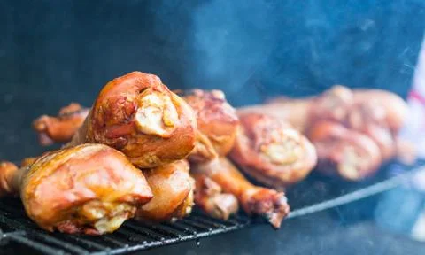 Turkey on the grill with smoke Stock Photos