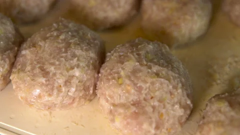 Turkey meat cutlets are prepared in the home kitchen Stock Footage 154628562