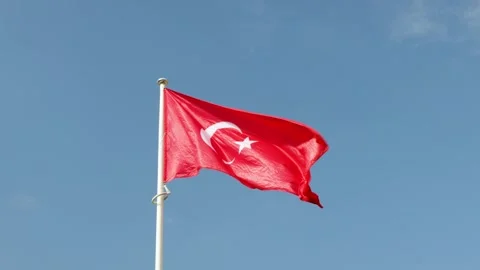 Turkey national flag waving in wind against blue sky Video stock 255151620