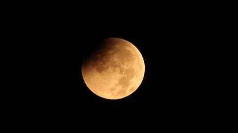 Turkey: Partial lunar eclipse lights up early morning sky over Ankara, T... Video stock 343820568