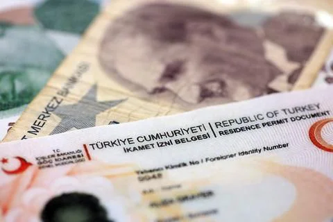 Turkey residence permit card document and turkish liras money bills banknotes Stock Photos