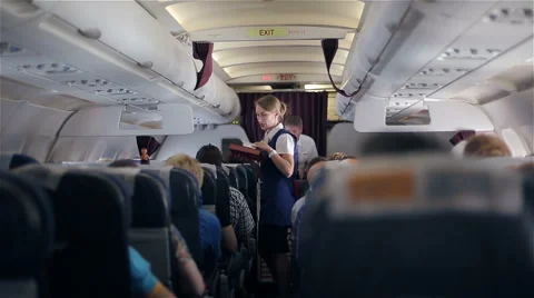 TURKEY, SIDE - JUNE 1, 2015: Air hostess of "Ural airlines" serves Stock Footage 51008114