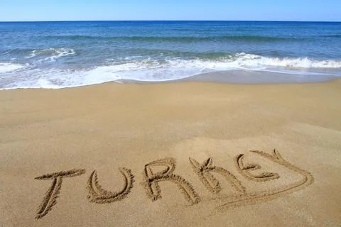 Turkey written on sandy beach Stock Photos