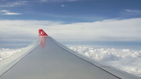 Turkish Airlines Wingtipand clouds in the Sky. Wide Angle Stock Footage 79180569