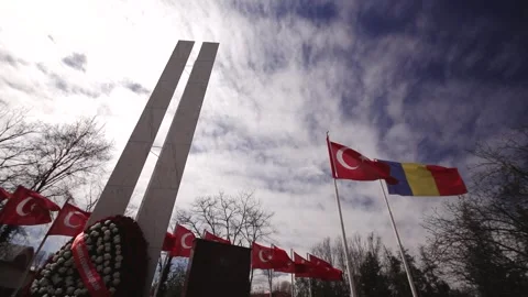 Turkish And Romanian Flags At War Memorial Stock Footage 336221382