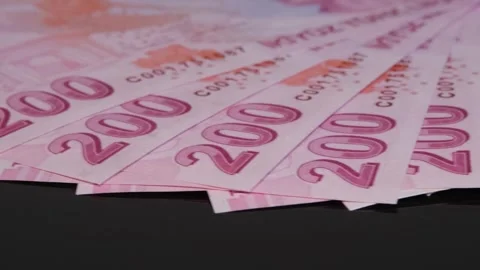 Turkish banknotes rotating on black background Stock Footage 312473103