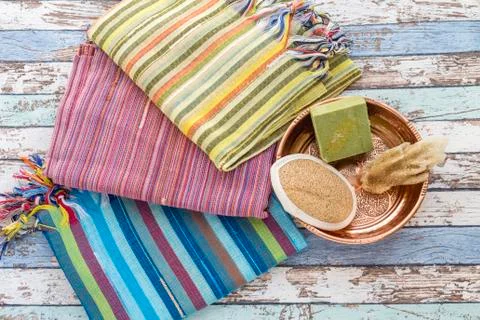 Turkish bath set with peshtemals, sponge, natural soap, and scrubber brush Stock Photos