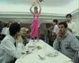 Turkish bell dancer on table in restaurant SD Footage