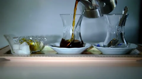 Turkish Black Tea, pouring to tea glass Stock Footage 156051069