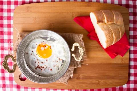 Turkish Breakfast - Fried Egg wit sliced bread on table Stock Photos