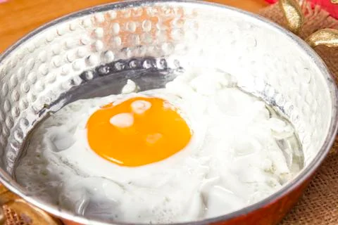Turkish Breakfast - Fried Egg wit sliced bread on table Stock Photos