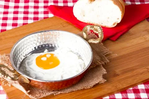Turkish Breakfast - Fried Egg wit sliced bread on table Stock Photos
