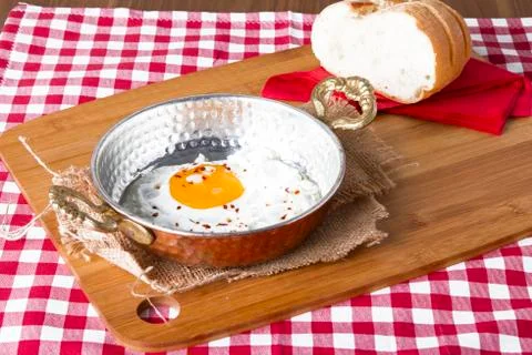 Turkish Breakfast - Fried Egg wit sliced bread on table Stock Photos