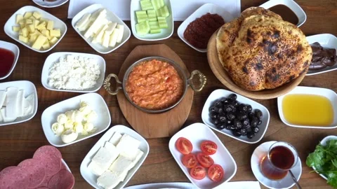 Turkish breakfast set of dishes on a table in a beautiful order. Stock Footage 150094240