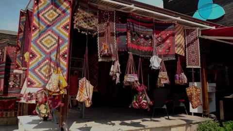 Turkish carpets are sold at a bazaar in Skopje Stock Footage 250018002