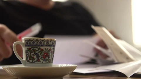 Turkish coffee cup on the table in office working man drinking turkish coffee. Stock Footage 118717646