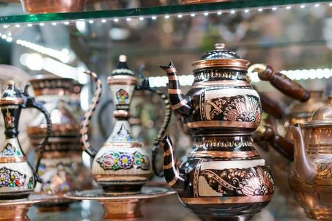 Turkish Copper Teapots with Mosaic Patterns on Bazaar Shelf Stock Photos