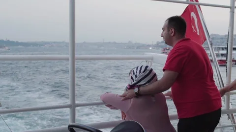Turkish Couple floating on the ship on the Bosphorus and talking. June 2018 库存影片 102909375