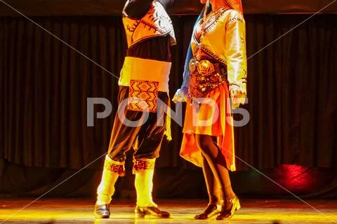Turkish dancers blacksea dance performance with ethnic garments Stock Photos