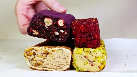 Turkish delight assortment in rolls with different fillings Stock Footage 311048065