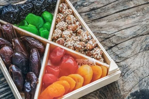 Turkish delight oriental sweets dried fruits and nuts in a wooden box Stock Photos