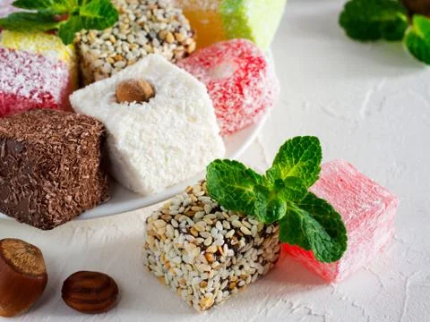 Turkish delight on white rustic background Stockfoto's