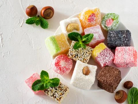 Turkish delight on white rustic background Stockfoto's