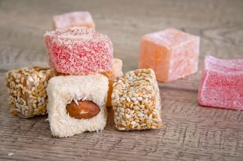 Turkish delight on a wooden table Stock Photos